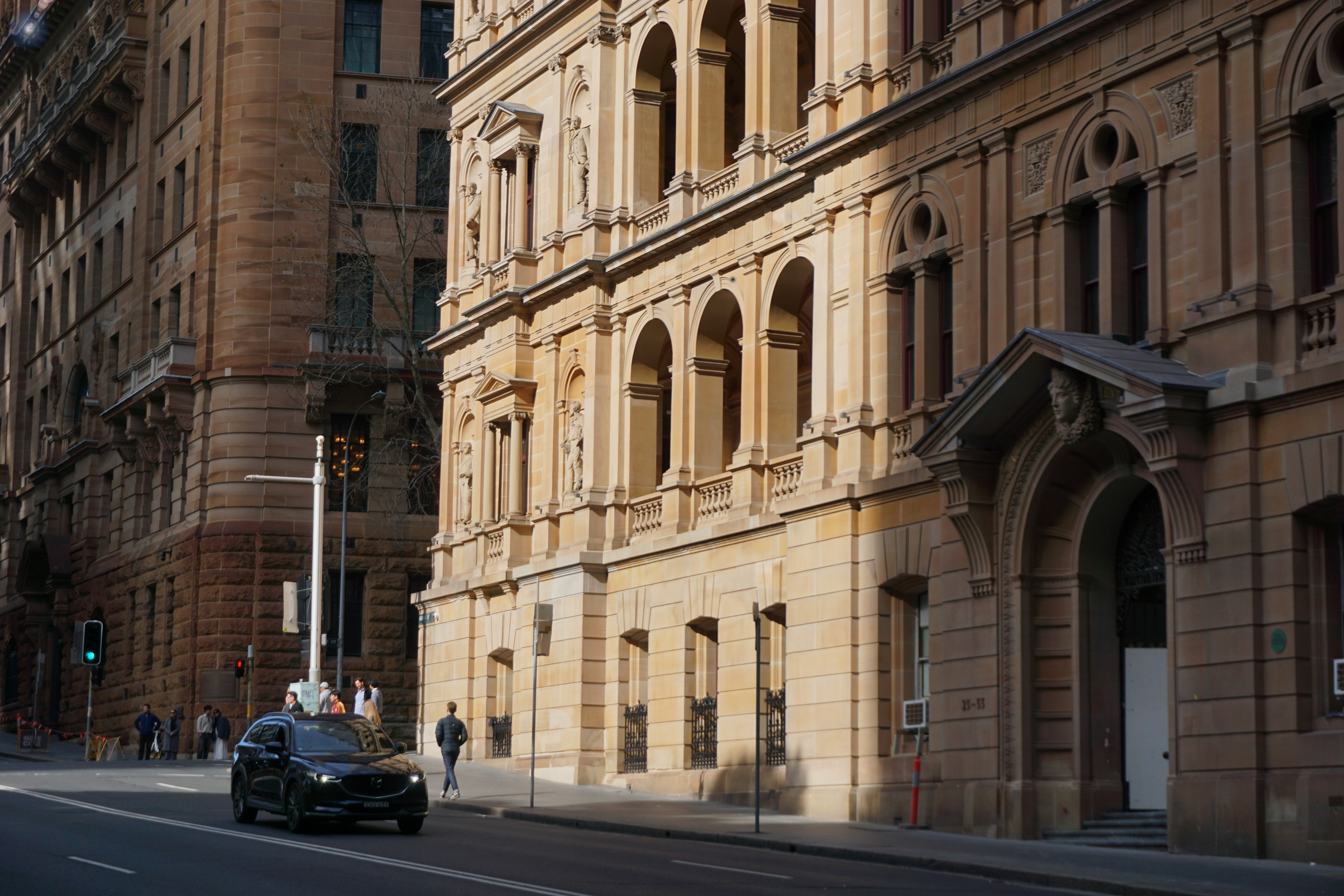 A street view of an old colonial bank in Sydney CBD